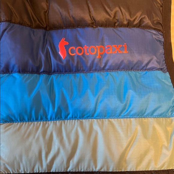 Cotopaxi Black and Blue Puffer Vest with Green Stripe - Picture 3 of 6